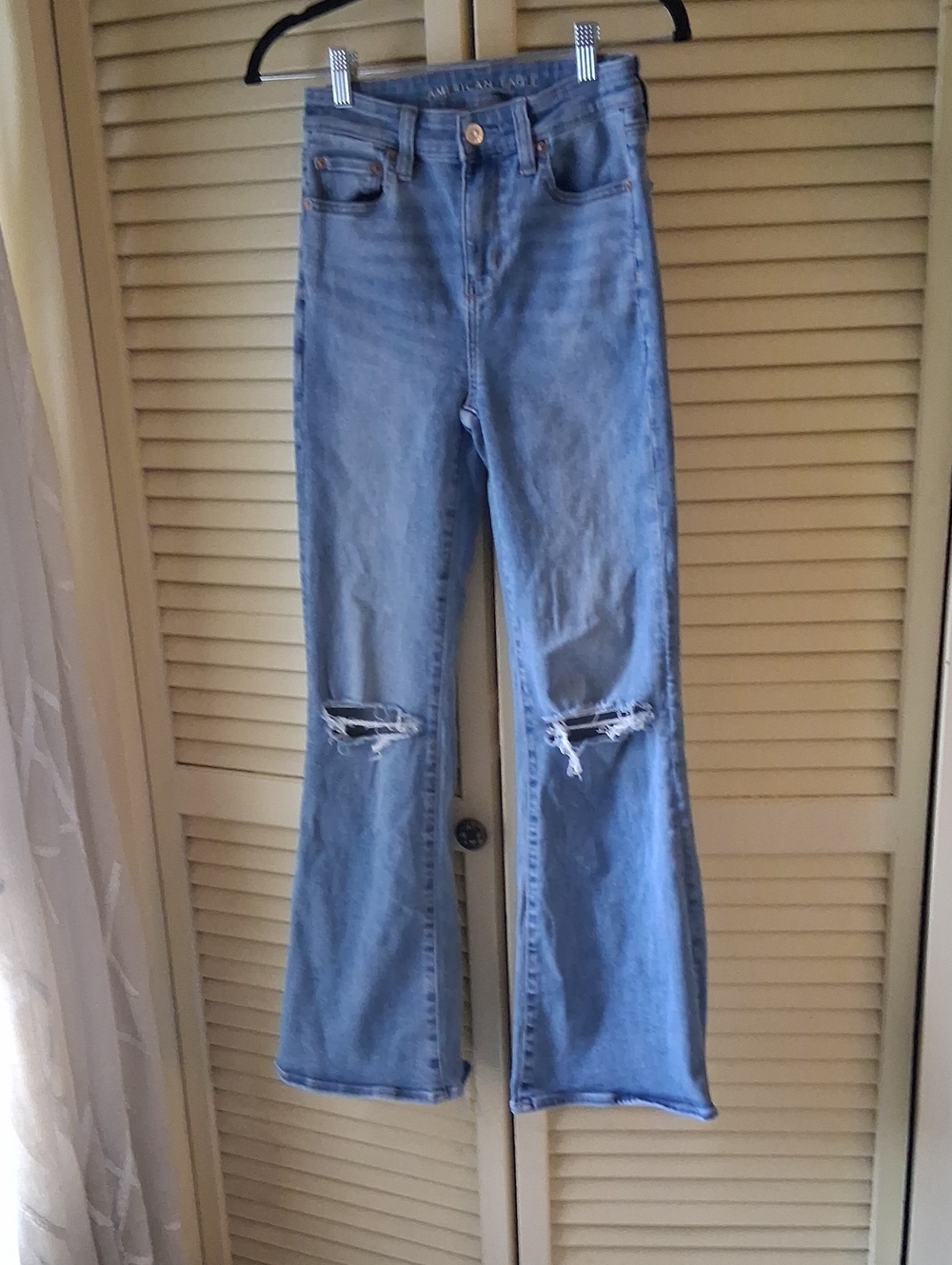 American Eagle Outfitters Light Blue Flare Jeans with Knee Distress